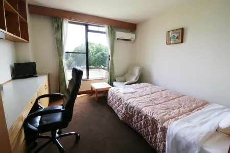 Kumozu Hotel and Conference Отели в г. Цу