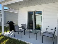 Spacious Kitchen and Cozy Patio - Charming Modern Getaway