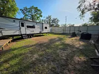 Stay at The Rusty Hooker a Cozy Camper in Perry Fl