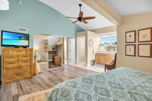 spectacular architectural home steps to the beach w/private heated pool on canal