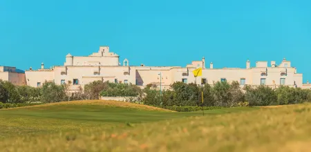 Masseria Messapia Wine Resort & Spa Отели в г. Мезанье