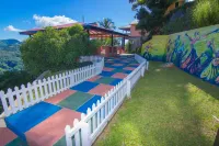 Samfi Gardens Hoteles cerca de Anse Galet Beach