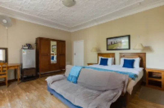 Agterplaas Guesthouse Pty Ltd Hoteles cerca de Centro Orígenes