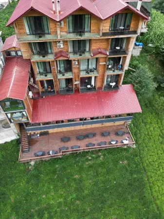 Yamacda Suit Otel Отели в г. Behice Koyu