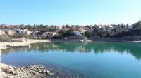 Family-friendly apartment Lilly with trampoline, air conditioning, wifi, up to 5 people
