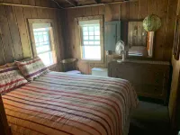 Torch Lake Village Cozy Cottage with private dock