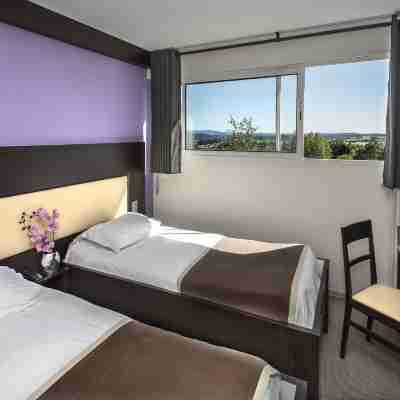 Logis Hôtel les Portes d'Apcher Rooms