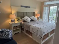 Sunset View Beach Bungalow - Pets Allowed. Amazing covered deck and yard.