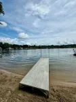AllSports lakefront cottage. 3 bedrooms, 2 baths, private beach, yard and deck Hotels in Grattan Township