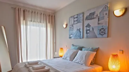 Cozy Beach Front with Rooftop Отели рядом с достопримечательностью «Praça D. João II»