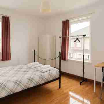 Spacious Three-Bedroom Apartment Rooms