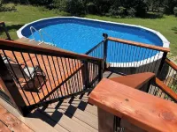 Real Log Cabin with Seasonal Pool and Hot Tub near Blue Springs Ranch