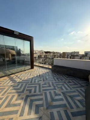 Modern Rooftop Apt with Private Terrace Hotels in Imbaba