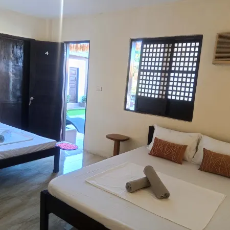 Quad or Family Room at V Hostel Galera Отели рядом с достопримечательностью «Водопад Тамарау»