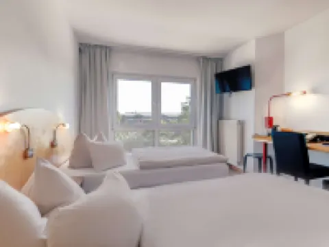 โรงแรมอัมบิเอนเต ลังเงินฮาเกิน ฮันโนเฟอร์ บายทิวลิปอินน์ โรงแรมในLangenhagen