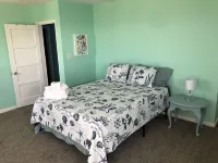 Beach Front on the Bay in Our Rustic, Pet Friendly Cottage 4 Bedroom Cottage by RedAwning Hotels near Embry-Riddle Aeronautical University