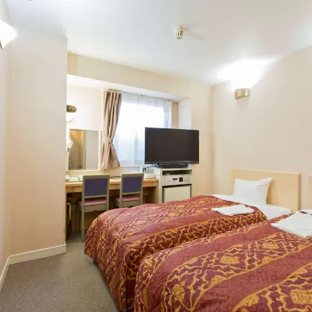 Business Hotel Palace Takamatsu Отели рядом с достопримечательностью «Башня Символ»