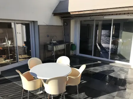 Luxury apartment with terrace on the shores of Lake Chambon overlooking Sancy