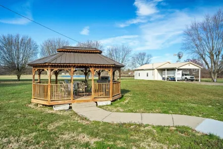 Country living at its best, chickens and a beautiful stocked pond to fish in