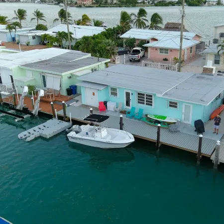 Oceanside waterfront 2/2 home with 55ft dock and paddle equipment