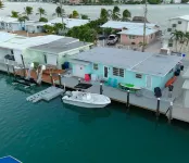 Oceanside waterfront 2/2 home with 55ft dock and paddle equipment