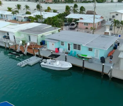 Oceanside waterfront 2/2 home with 55ft dock and paddle equipment