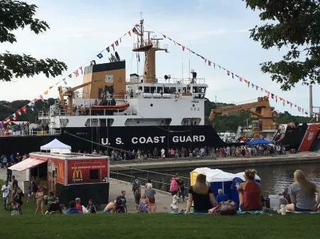Right across from Beach and Grand Haven Pier!  Beautiful Lake and Sunset Views!