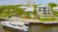 Newly Renovated modern waterfront beachhouse with 9 beds. Sleeps 18 Hotels in Mimo