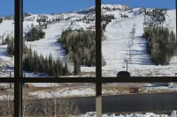 FRONT AND CENTER for 8! PANORAMIC VIEWS! Wall of windows facing slopes! GARAGE!