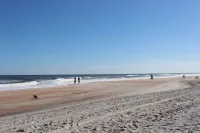 Southern C's Beachfront condo, tropical heated pool, great for family or couple