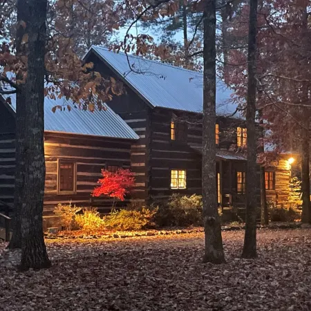 Prospect Mountain Cabin custom log home sportsman's paradise with fishing lake.