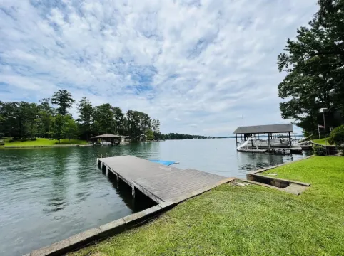 Lake Front Cabin W/ Screened-in Porch and personal dock - Close for Auburn games
