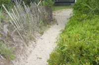 30 Steps to the Beach! Luxury Condo with Large wrap-around porch!