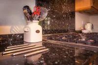 Chocolate-box pretty Pear Tree Cottage in South Downs village