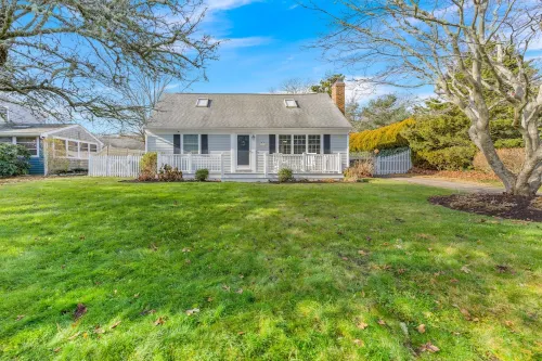 Walk to beach, fenced yard, and toys for the kids!