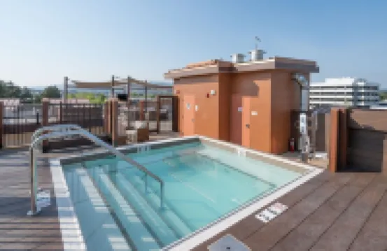 Work Here • Secure • Elevator • Luxe Kitchen & Bath • King Bed • W/D • Gig WiFi