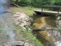 A Stream  runs through it. Comfy little cabin with a stream by your bedroom. Hotels in Oscoda County
