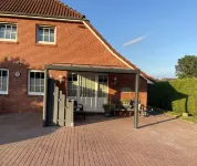Vacation apartment Strackholt Hotel dekat Museum Oll Reef Hus J. u. G. Tjaden