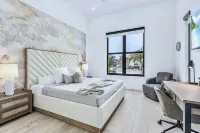 Maple Shore Homes Welcomes you to Modern Oasis Naples Park!