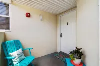 Pool View Balcony and Tropical Landscaping - Beautiful Coastal Escape