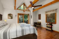 Waterfront Cabin with Hot Tub and Outdoor Fun - Cozy River Retreat