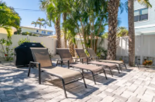 Heated Pool and Cozy Living Area - Charming Coastal Haven