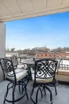 Private Balcony and Vibrant Downtown Access - Stylish Haven