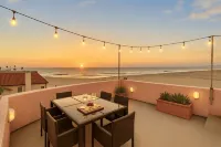 Rooftop Deck and Direct Beach Access - Enchanting Coastal Haven