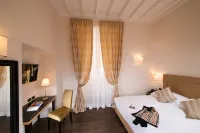 Tridente Suites Отели рядом с достопримечательностью «Пантеон»