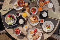 Staudacherhof in Garmisch-Partenkirchen I Blick Aufs Zugspitzmassiv I Einzigartige Bayurvida Küche Hotels in Garmisch-Partenkirchen
