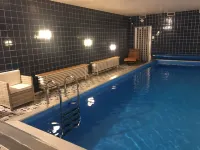 Berghotel Hahnenklee mit Ferienhaus - Pool