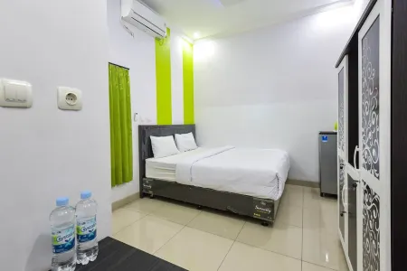 Green Belt Kost Exclusive Отели в г. Ngemplak