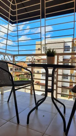 Modern Cozy Department -  with Netflix & TV Cable In Santo Domingo Este R.D Отели рядом с достопримечательностью «Маяк Колумба»