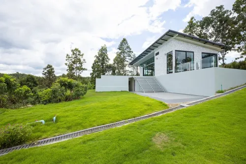 Swimming pool along the terrace, panoramic view surrounded by nature